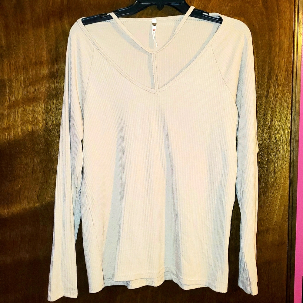 Long Sleeve cream dressy top with cut neck line